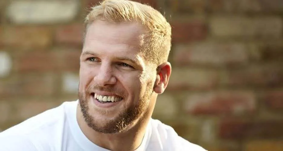 Portrait of James Haskell smiling outdoors